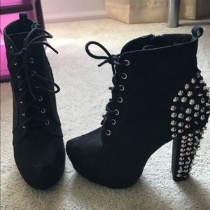 Black pumps w/ spike studded heels